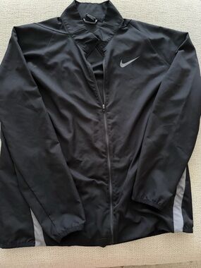 Nike Men's Black Windbreaker Jacket with Reflective Swoosh